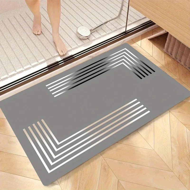 

Luxurious thick anti-slip diatom mud floor mat - soft, water-absorbent, quick-drying, with elegant grey and gold striped design.