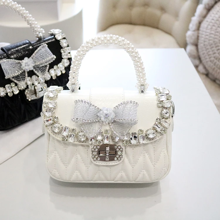 

Japanese Lolita Womens Handbag Pleated Diamond Bow Pearl Decorated Shoulder Bag 2025 New Sweet Cute and Elegant Messenger Bag