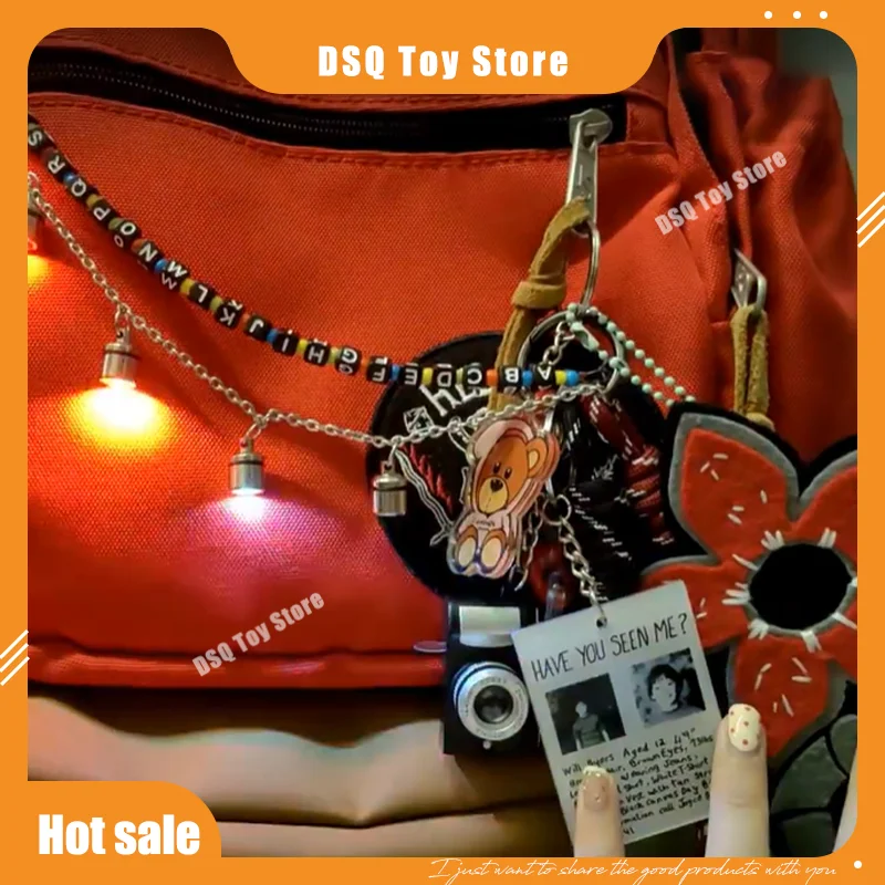 Regalo de Navidad Stranger Things periférico Dada cadena colgante lámpara de letras bolso de diseño hecho a mano mochila colgante Universal