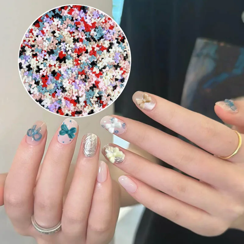 100 unidades de Mini lazo para uñas, dijes de resina, joyería 3D, lazo de colores mezclados, accesorios de decoración de uñas japoneses, suministros, piezas bonitas para decoración de uñas DIY