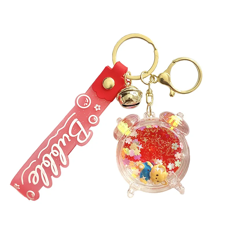 

Miniso High-end and exquisite oil alarm clock, floating sand, key chain, bag pendant, car key chain, pendant, claw machine