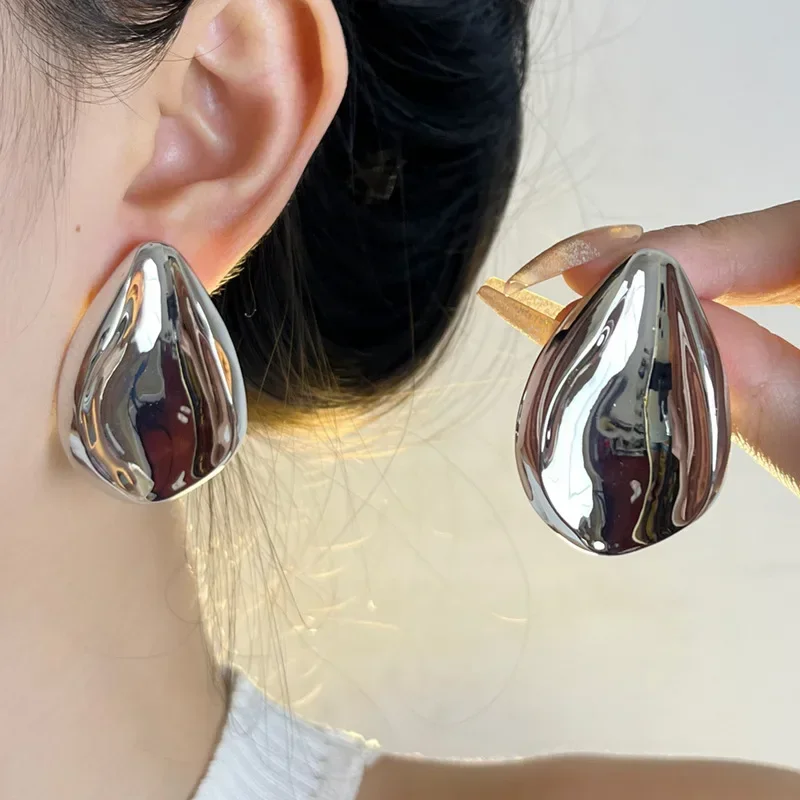 Cold wind smooth surface metal water droplets unique new irregular explosion high sense exaggerated earrings