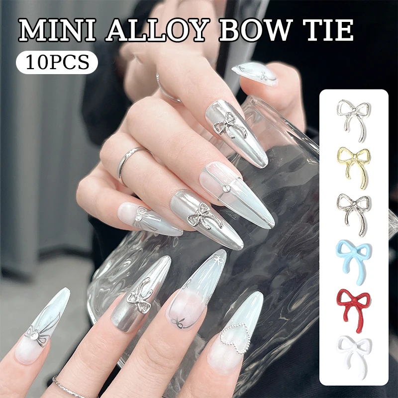 10 pz Kawaii Bowknot metallo oro argento ciondoli per unghie 3D lega papillon gioielli decorazione strass per unghie accessori per Manicure