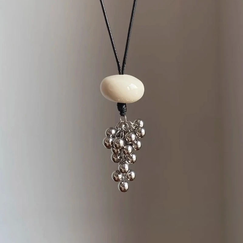 

Luxury-inspired fringe pendant necklace Women's fashion pearl strand accessory Casual sweater chain