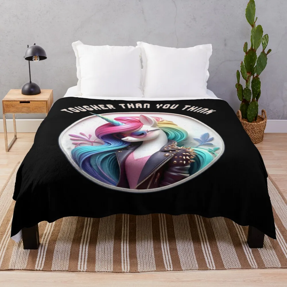 Cute Unicorn wearing a Leather Jacket, Text: 'Tougher than you think.' Throw Blanket Plush Blankets