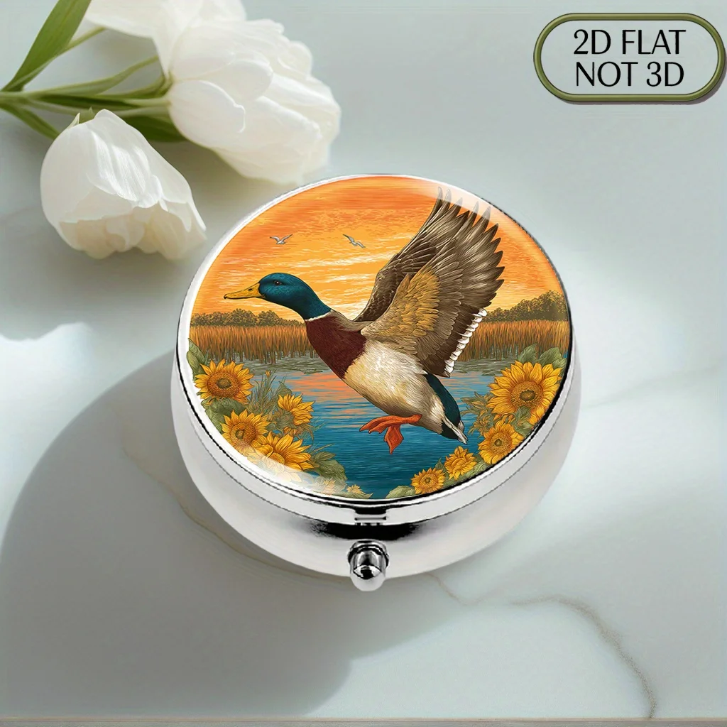 Single-piece flat, portable, round metal pill box, decorated with patterns of ducks flying over the water, sunflowers, and sunsets, suitable for organizing daily medication, vitamins, and small accessories, convenient for travel, and also makes a great gift for friends and relatives, with a flat design