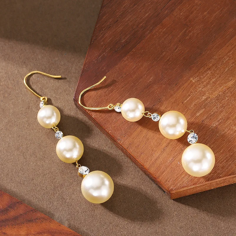 

Gentle temperament long pearl tassel ear hook earrings niche light luxury simple high-end earrings women's fashion earrings