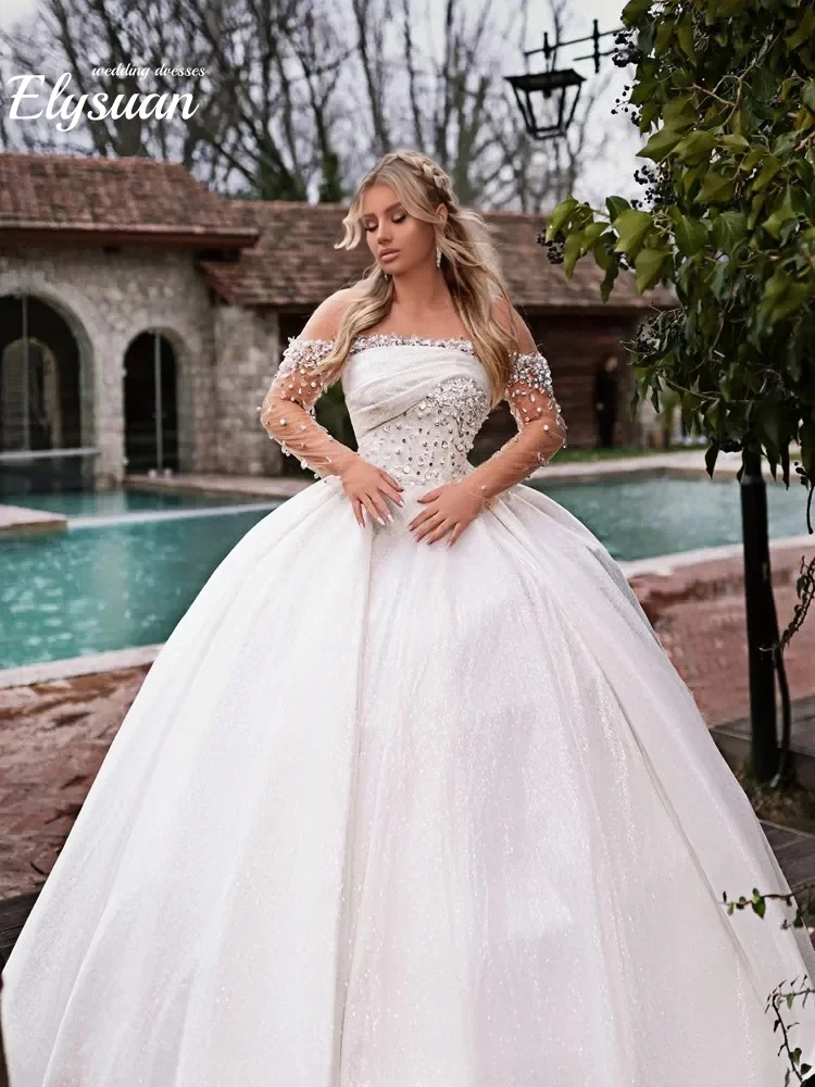 Maßgeschneiderte Perlenkristalle Arabische Gartenhochzeitskleider Ballkleid Schulterfrei Spitze Illusion Lange Ärmel Brautkleid