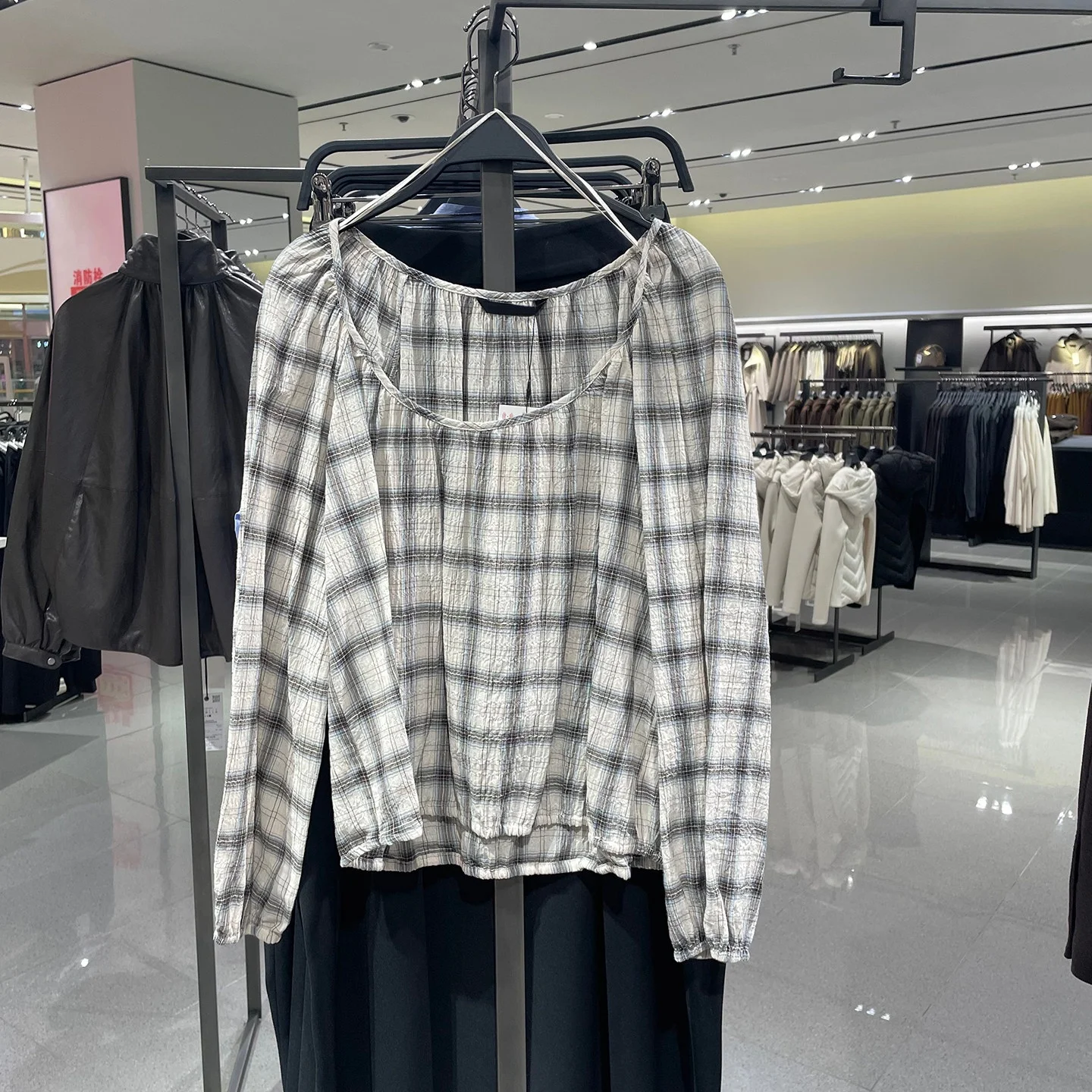 

2026 new women's clothing style long sleeved round neck plaid elastic shirt A-line asymmetrical skirt mid waist half skirt