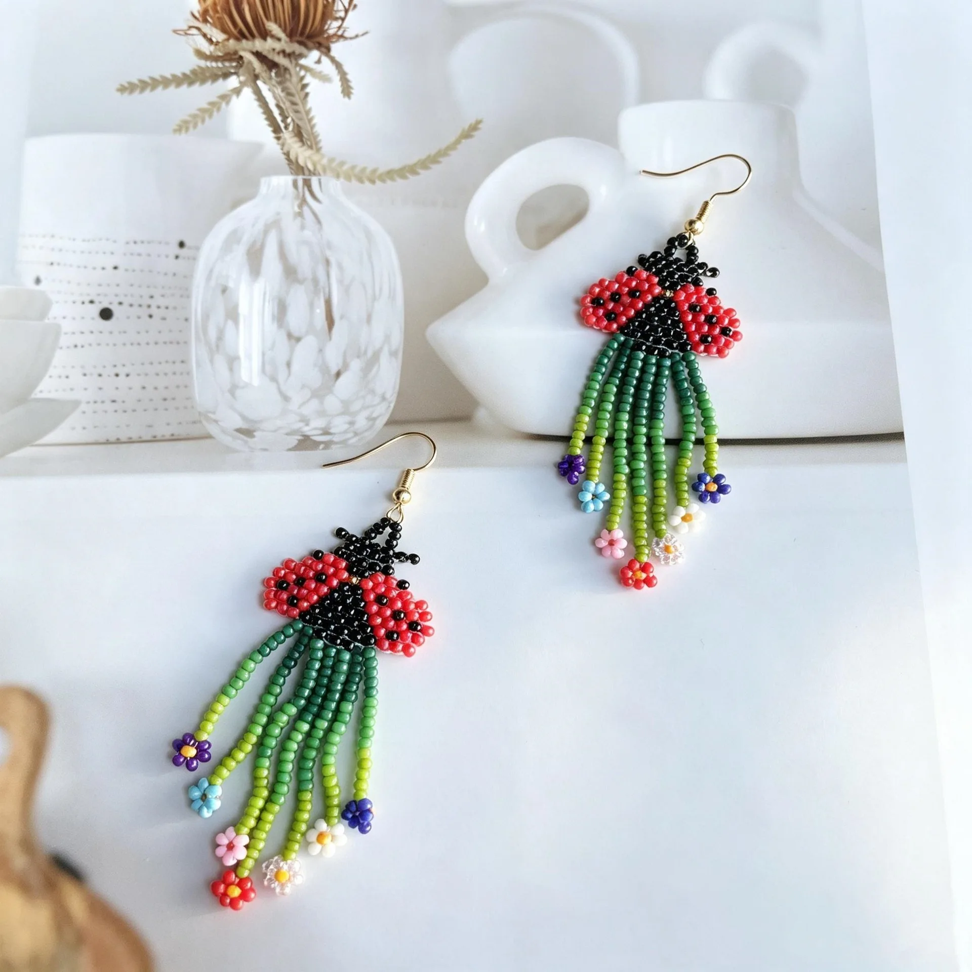 ZGMXR Rice bead earrings Tassel  Beetle Butterfly Mushroom Bohemia Hand-woven Alloy Woman Fashion Simple Beaded earrings