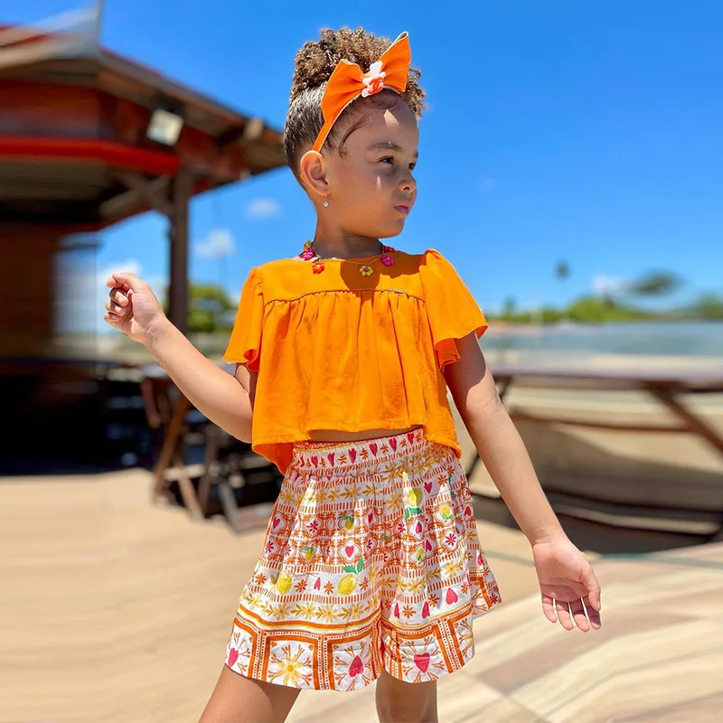 Set di vestiti estivi per neonate per bambini Casual Solid Ruffles t-shirt a maniche corte Crop Top + pantaloncini con stampa a cuore abbigliamento per bambini