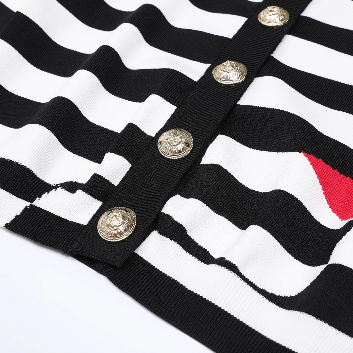 Haute qualité automne nouveau rayé à la mode tempérament déplacements femmes tricoté à manches longues col rond Cardigan haut veste