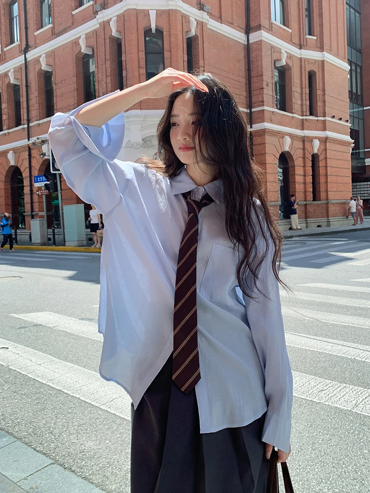 

Светло-голубая женская свободная блузка с длинным рукавом и завязками в корейском стиле, новинка весенней коллекции, очень красивый топ