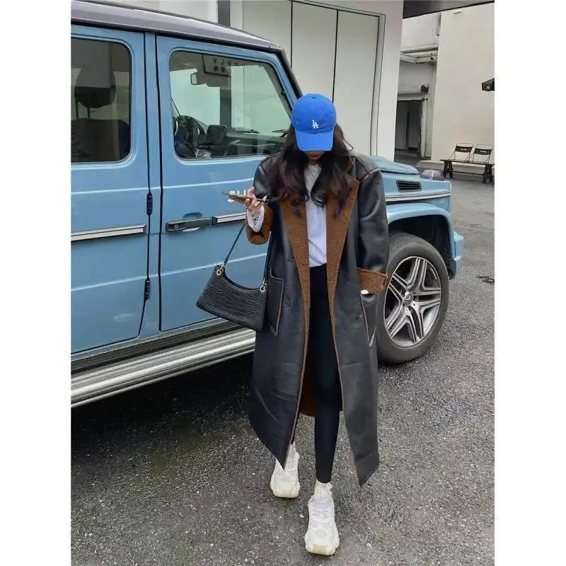 เสื้อโค้ทตัวยาวสำหรับผู้หญิง สไตล์เกาหลี สำหรับฤดูใบไม้ร่วงและฤดูหนาว ขนเฟอร์ อุ่นสบาย เหมาะสำหรับสาวออฟฟิศ แฟชั่น ปกพับได้ ใส่ได้สองด้าน