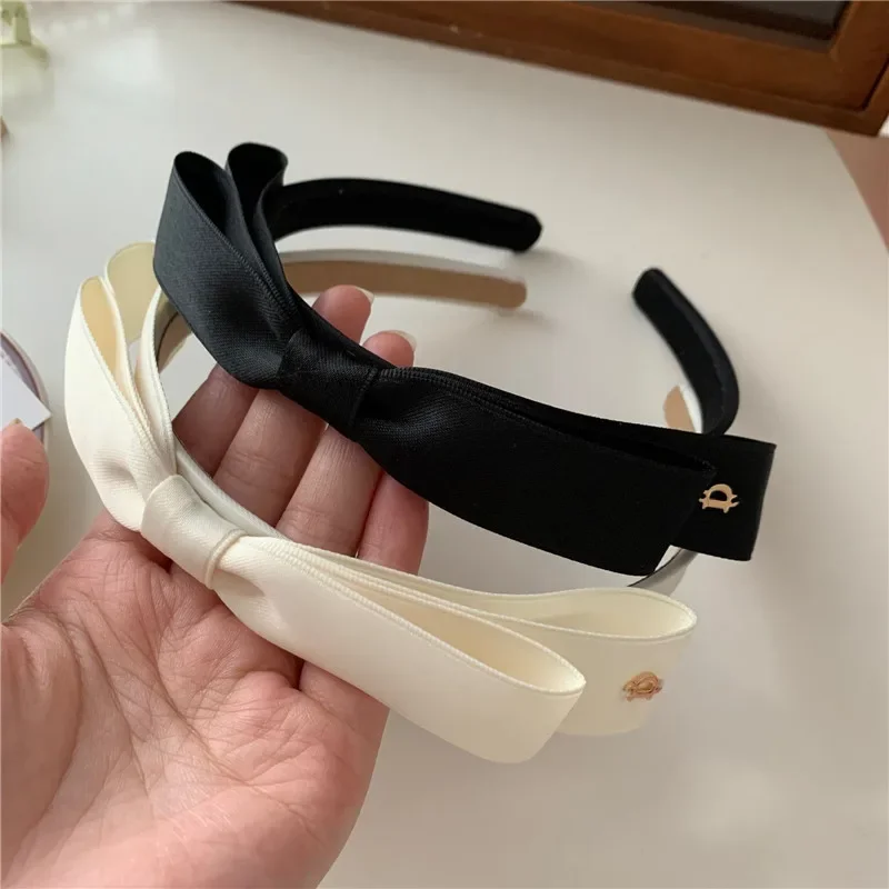 Korean Internet celebrity French retro d letter bow high sense headband princess fan elegant temperament headband pressure hair