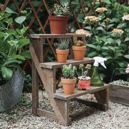 

Three-layer stepped small flower stand Solid wood retro old balcony Garden potted plant rack against the wall