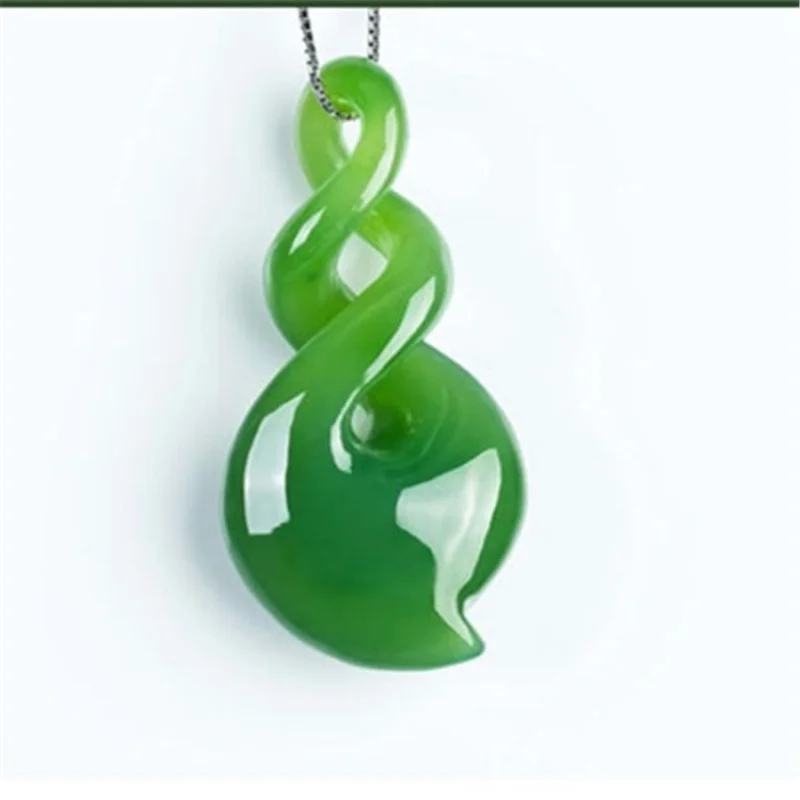 Xinjiang Hetian Magnolia Flower Men's and Women's Twisted Qiankun Jade Pendant