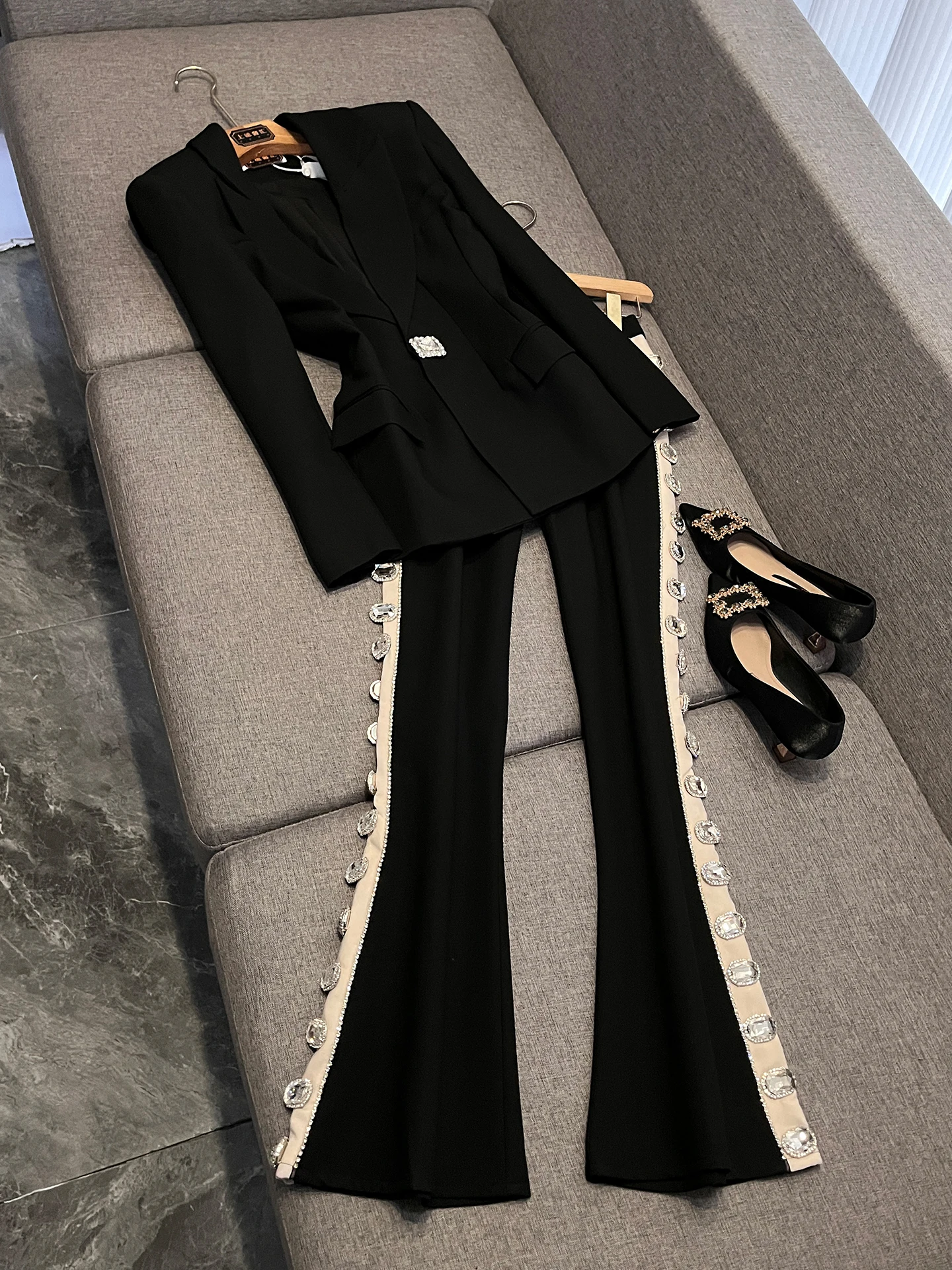 

Elegant Diamond Buttoned Waist-Cinching Shoulder-Line Suit Jacket And Hollow out Flared Pants Set for Women Spring 2026