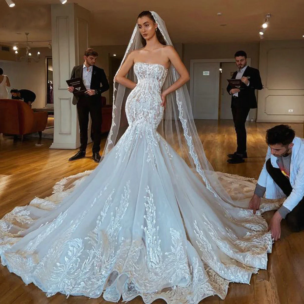 

Luxury Mermaid Wedding Dress 2025 Strapless Illusion Dubai Arabic Bridal Gowns Open Back Lace Appliques Vestidos De Noiva