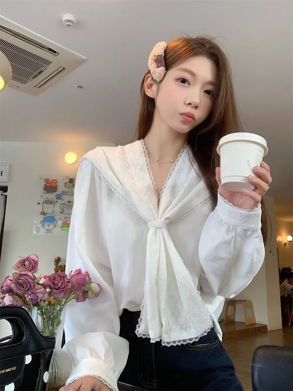 เสื้อเชิ้ตแขนยาวผู้หญิงลายทางทรงโอเวอร์ไซส์ติดกระดุมแขนทรงโคมจีบชายเสื้อสไตล์พรีปปี้ เรียบหรู สไตล์ฝรั่งเศสย้อนยุค