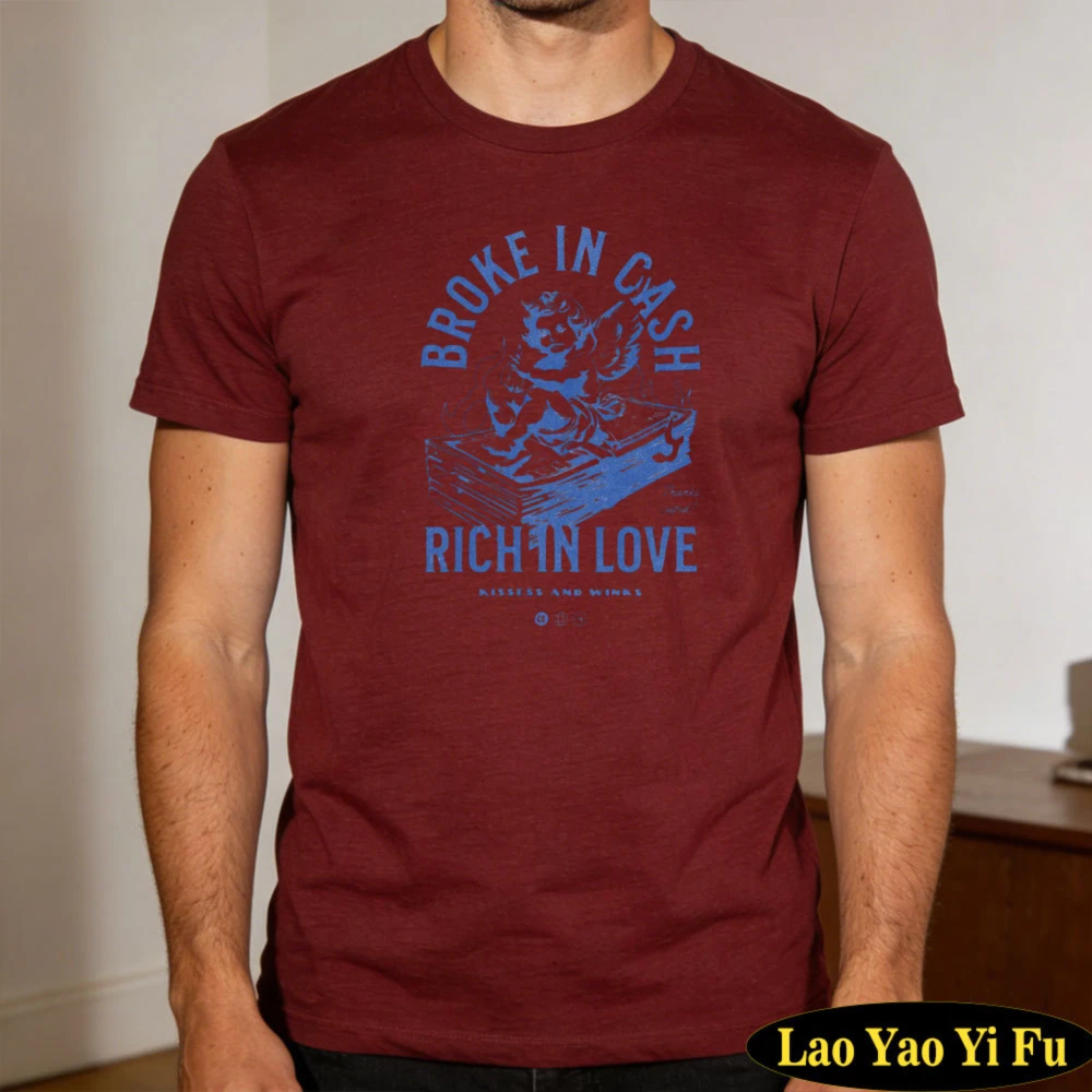 Blue Graphic Arch Text Cherub Figure Broke In Cash Rich In Love Stack Of Money Circular Design Men Crew Neck Short Sleeve