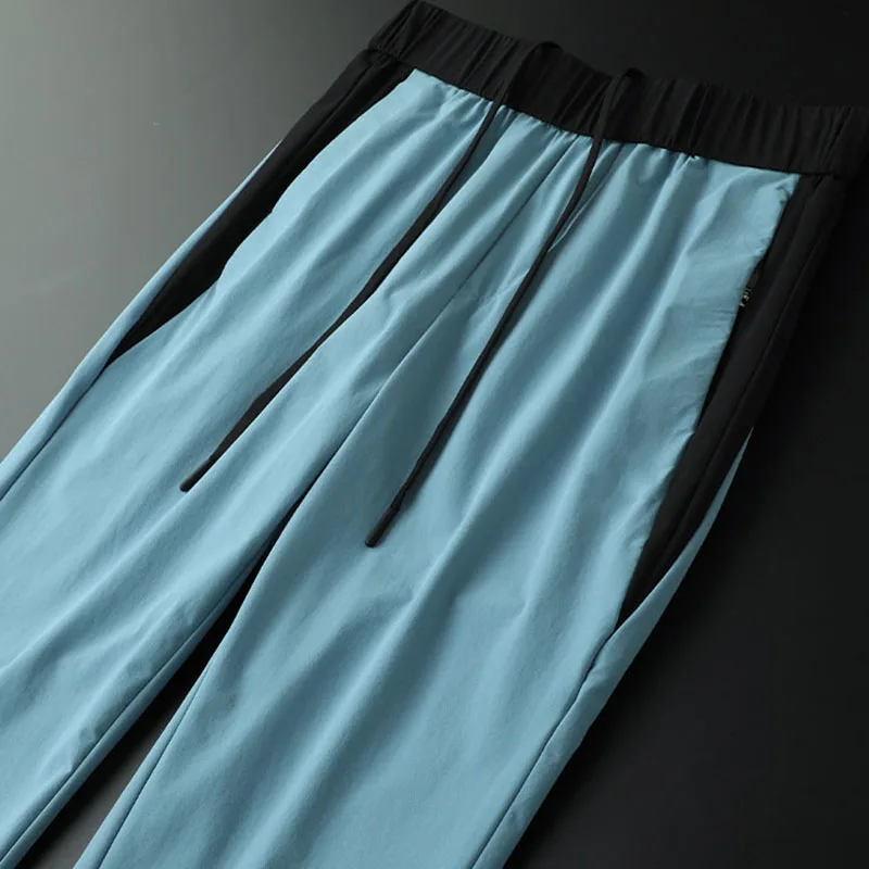 Fashionable patchwork design casual sport pants for men, summer thin men's quick-drying anti-wrinkle small leg sweatpants