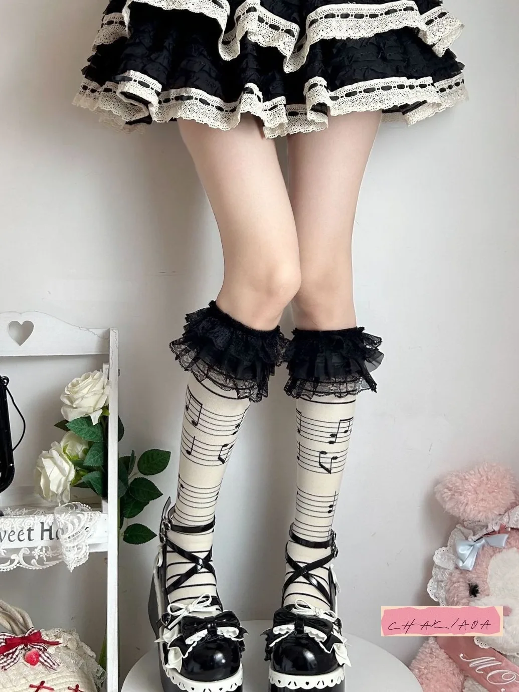 Nicho fresco dulce Retro nota musical encaje calcetines de tubo medio subcultura Y2k milenario Lolita Girlie Jk pantorrilla presión calcetines mujeres