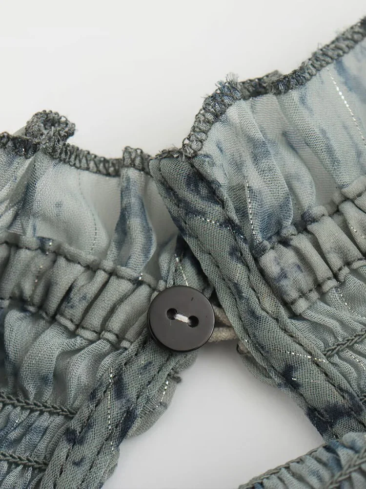 2025 Camicia a maniche lunghe ampia con stampa di linee di colore metallizzato alla moda in stile europeo e americano delle nuove donne