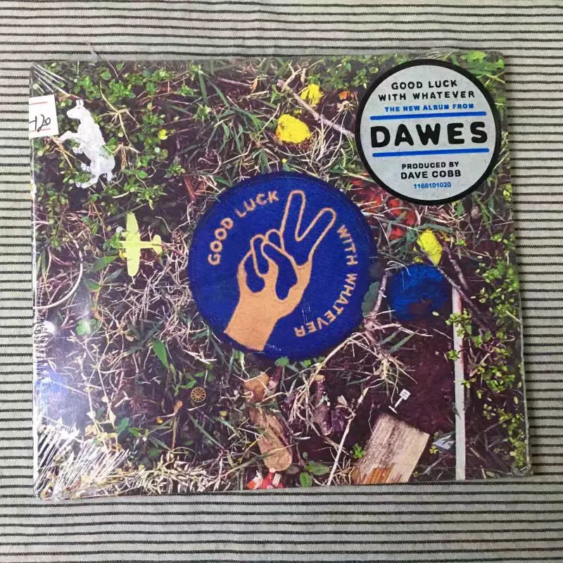 قرص مضغوط Dawes - حظًا سعيدًا مع أي مكان ما، قرص مضغوط لعام 2020، ألبوم ستوديو السابع، Folk Rock/Roots Rock، 9 مسارات، أكتوبر 2، 2020،