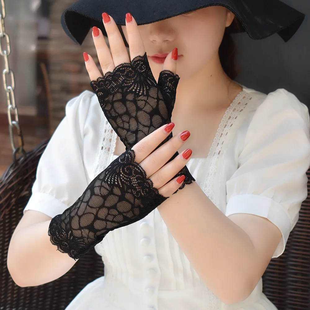 

A Thin Lace Fingerless Glove with Sun and UV Protection for Sailor Dance Performances