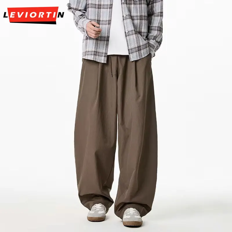 

Мужские брюки в японском стиле с плиссировкой, весенние, с изогнутым низом, свободные, однотонные, слегка расклешенные, повседневные