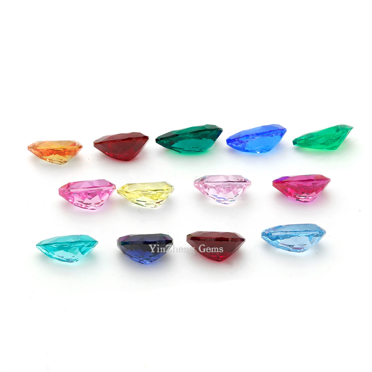พลอยสังเคราะห์รูปทรงลูกแพร์แบบหลอมละลาย ยี่ห้อหยินเจิ้ง  สีแดง/สีฟ้า/สีพาราอิบา/สีปาปาราชะ/สีเหลือง/สีเฟนต้า