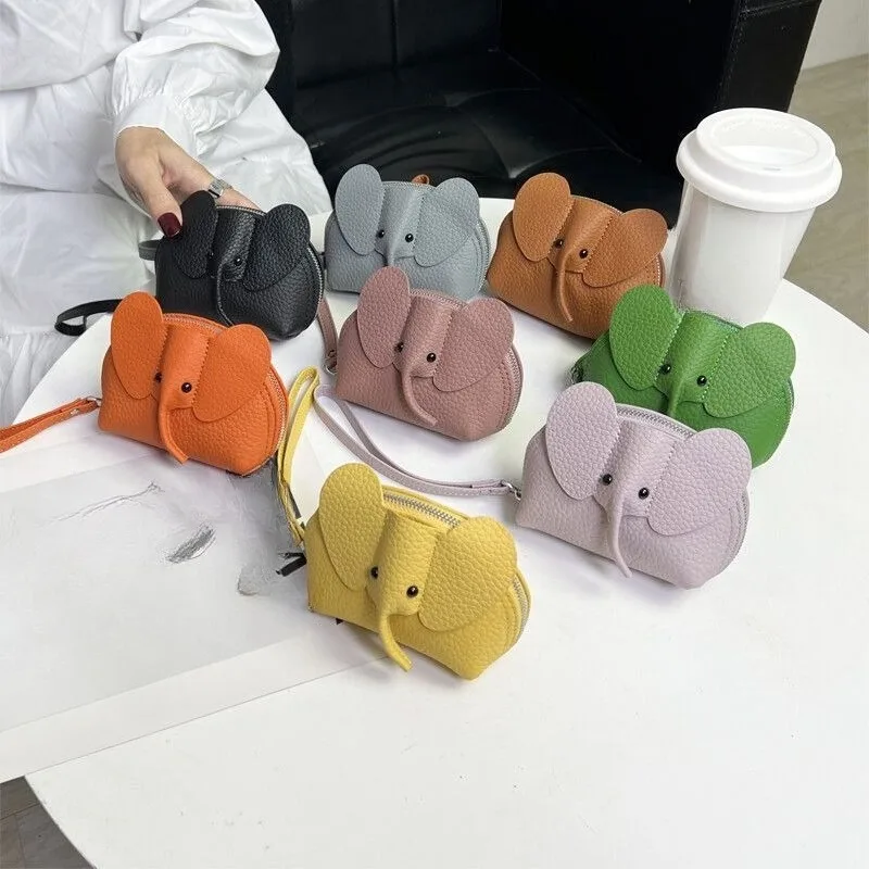 bag pendant, women's key bag, creative card bag, leather baby elephant change bag, zipper, twist lipstick storage bag.