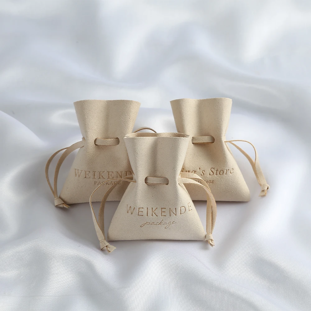 

Luxury Cream Microfiber Jewelry Gift Bags Custom Logo Wedding Favors For Guests Bulk 50 Suede Drawstring Organizer Packaging Bag