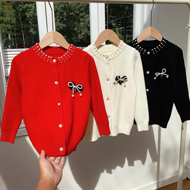 

Girls' Korean Version of Pearl Bow Red Sweater Cardigan 2025 Autumn and Winter Knitted Sweater Trendy Korean Button Top