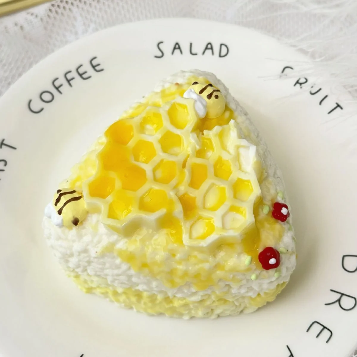 

Simulated Rice and vegetable roll extrusion toy slow rebound decompression silicone toy creative cartoon cake Q elastic decompre