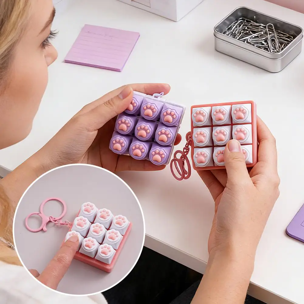 

Брелок-клавиатура с 9 клавишами в виде кошачьих лапок, механическая кнопка-брелок с LED-подсветкой для снятия стресса, для женщин, мужчин, подростков, геймеров