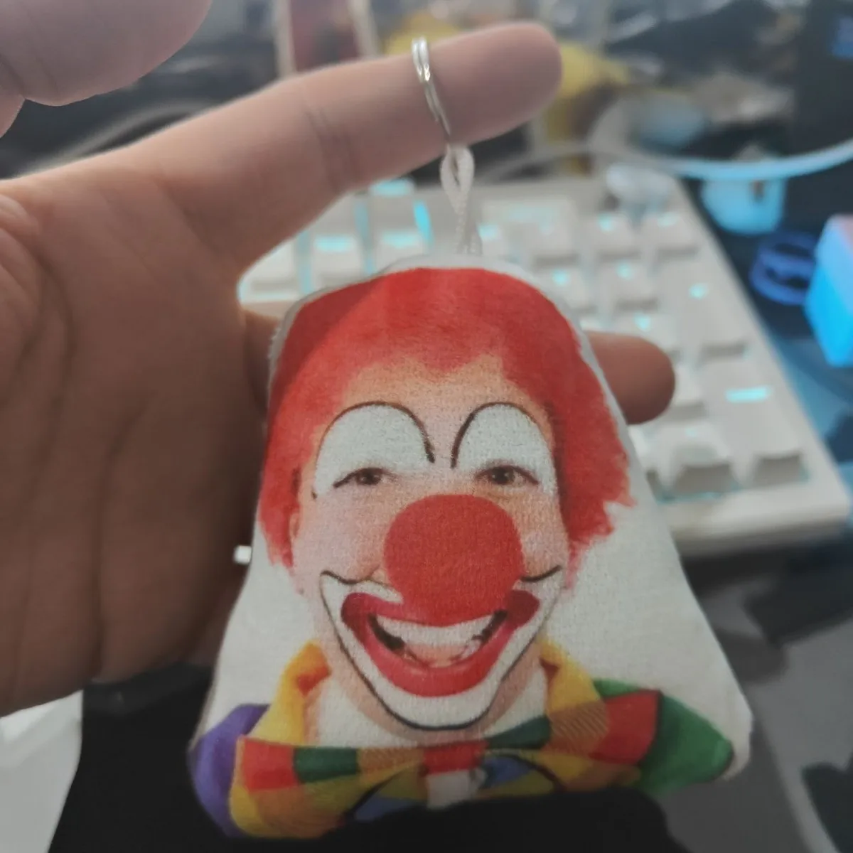 

1Pc Popular Short video awkward clown keychain with sound-making feature when pressed, highlighting funny and quirky personality