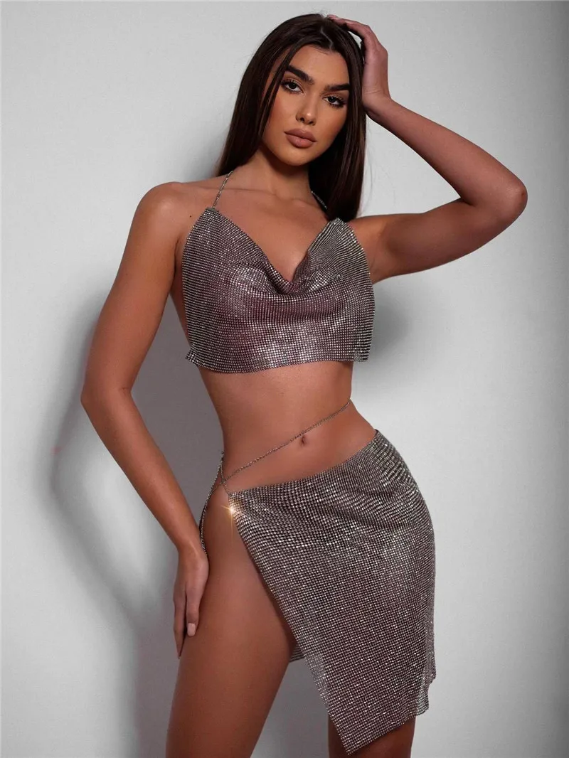 

Women 2 Piece Set Shiny Rhinestone Sexy Backless V Neck Crop Top And Crystal Metal Split Mini Skirt Suit Nightclub Party Outifit