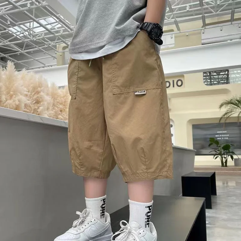 

2023 Summer Fashion Boy Clothing Solid Color Breathable All-match Spliced Pocket Elastic Waist Loose Casual Harem Capris Pants