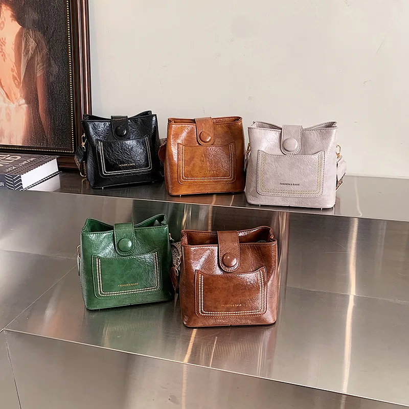 

Vintage-style shoulder bag with unique design, contrasting colors, crossbody bag with wide shoulder strap, large capacity