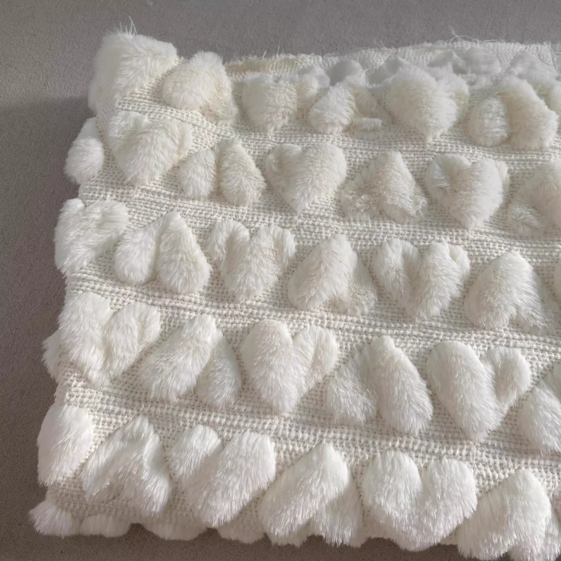 

White heart-shaped fur imitation fabric for autumn and winter clothing fabric diy polyester fabric