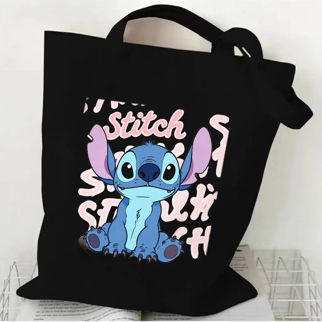 حقائب اليد المصنوعة من القماش باللونين البيج والأسود من Lilo & Stitch - رسم توضيحي لشخصية الغرز الملونة، اقتباس تحفيزي 'معرف ماذا أنت #4