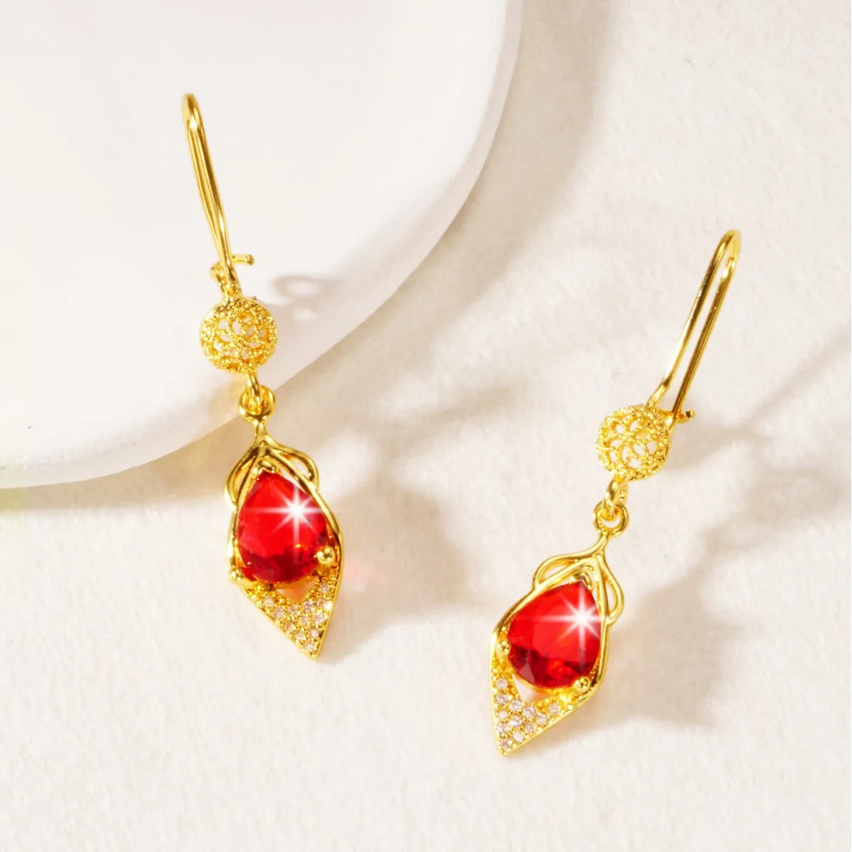 Huixing high-end red zircon earrings women's spring and summer new simple temperament fashion super fairy water drop earrings ea