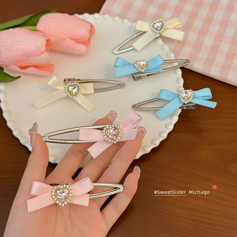 

2pcs/set Korean Sweet Bow Knot Hair Clips Trendy Shiny Heart Rhinestone Bangs Hairpin Charm Hair Accessories for Girls Headwear