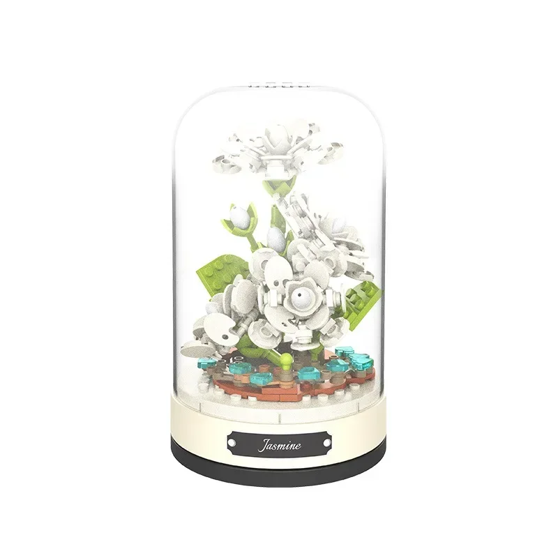 Building blocks music box Clockwork rotating music box Building blocks Rose Lily of the valley puzzle set Valentine\'s Day gift