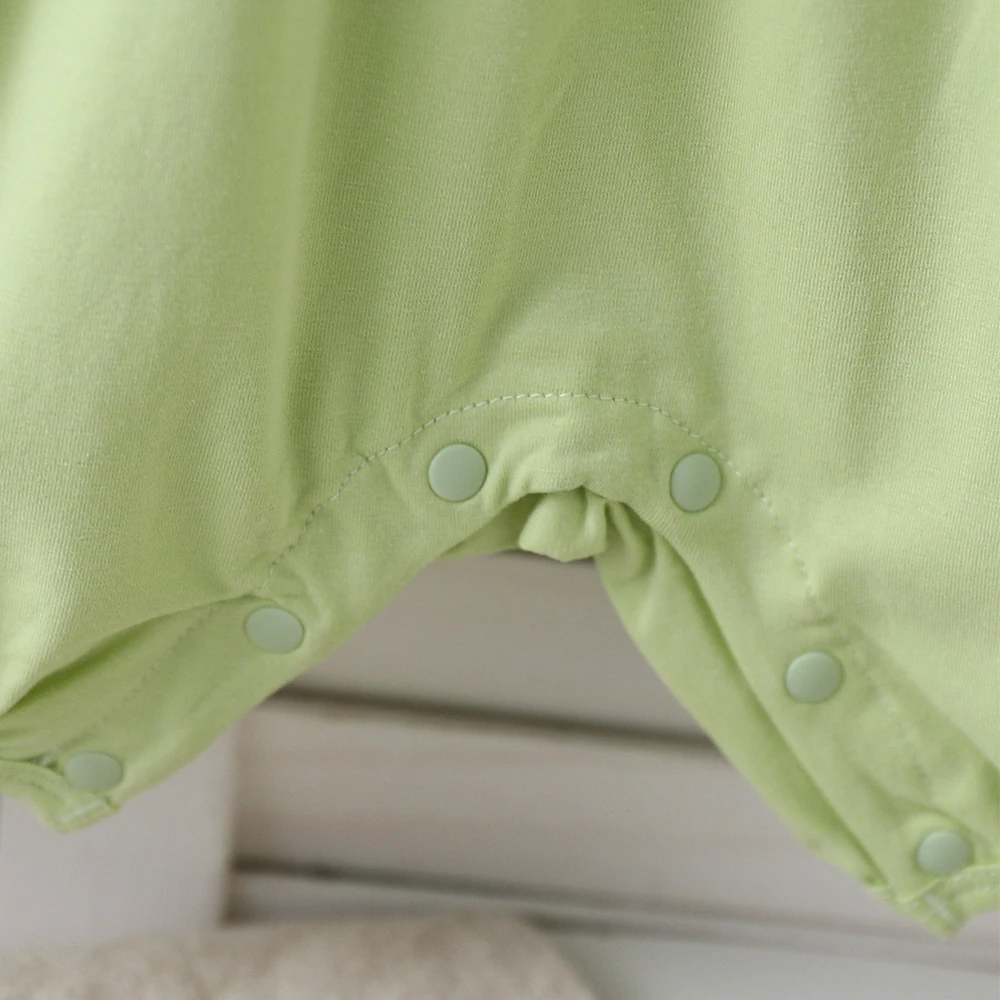 بدلة قفز صيفية لطيفة على شكل ديناصور مكونة من قطعتين من القطن بأكمام قصيرة