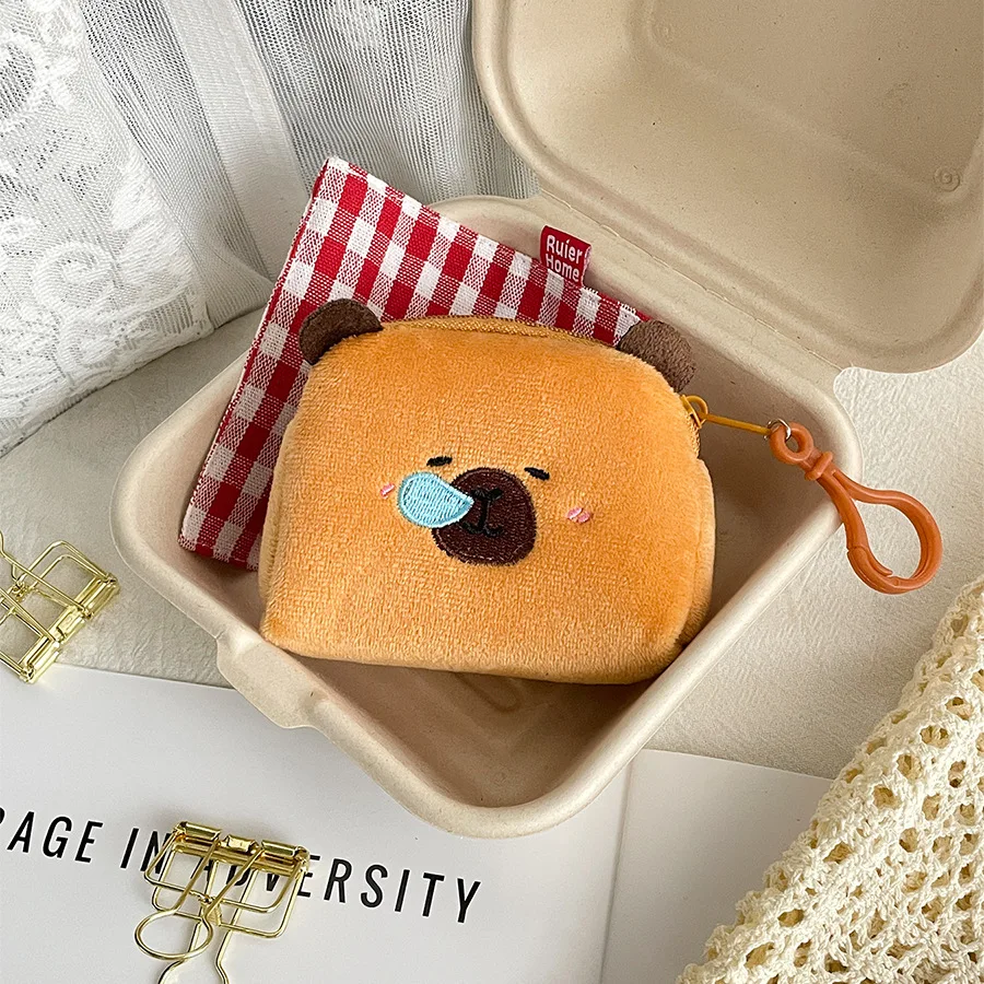 Nouveau créatif Capybara Anime en peluche porte-monnaie belle bande dessinée Capybara en peluche portefeuille fille casque sac de rangement enfants cadeau