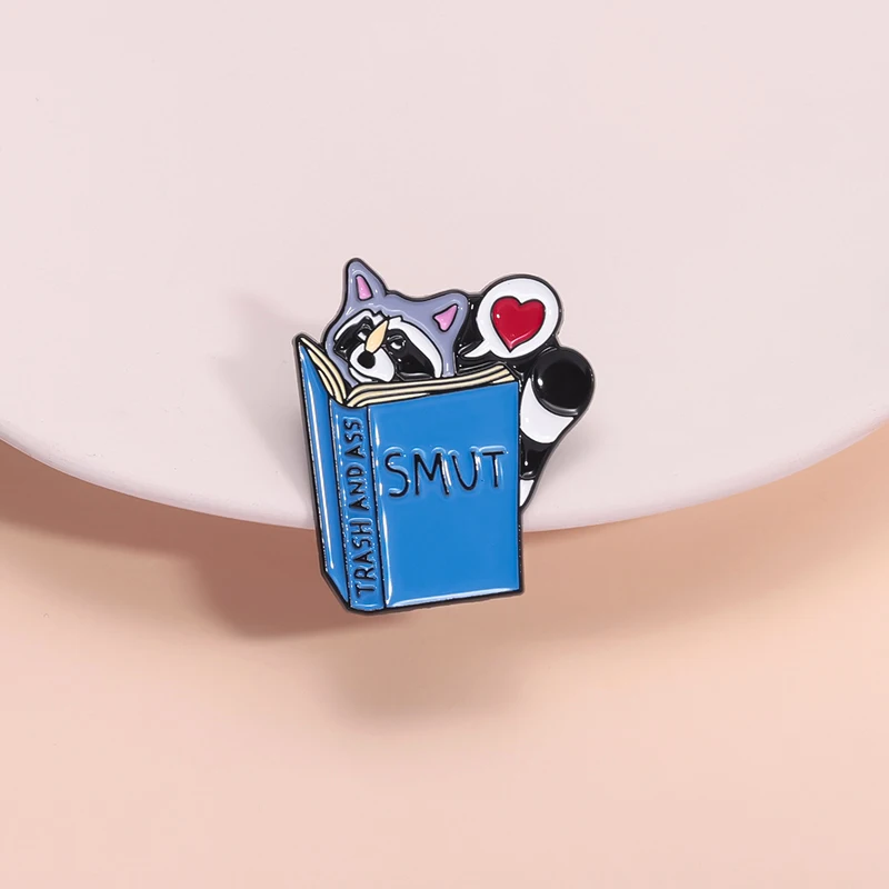 Love Reading Enamel Pins Custom Cute Cartoon Raccoon Brooches Lapel Badges Clothes Animal Jewelry Gift for Kids Friends