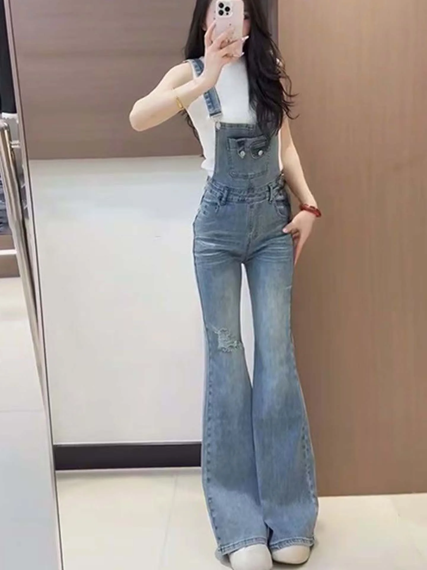 

Джинсы-колокольчики с высокой талией, женские рваные джинсовые брюки, осень 2024, новые повседневные широкие брюки, модный комбинезон, нагрудник...